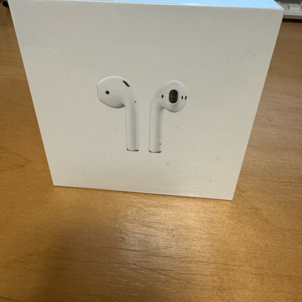 Brand new in box Apple AirPods with Charging Case - White